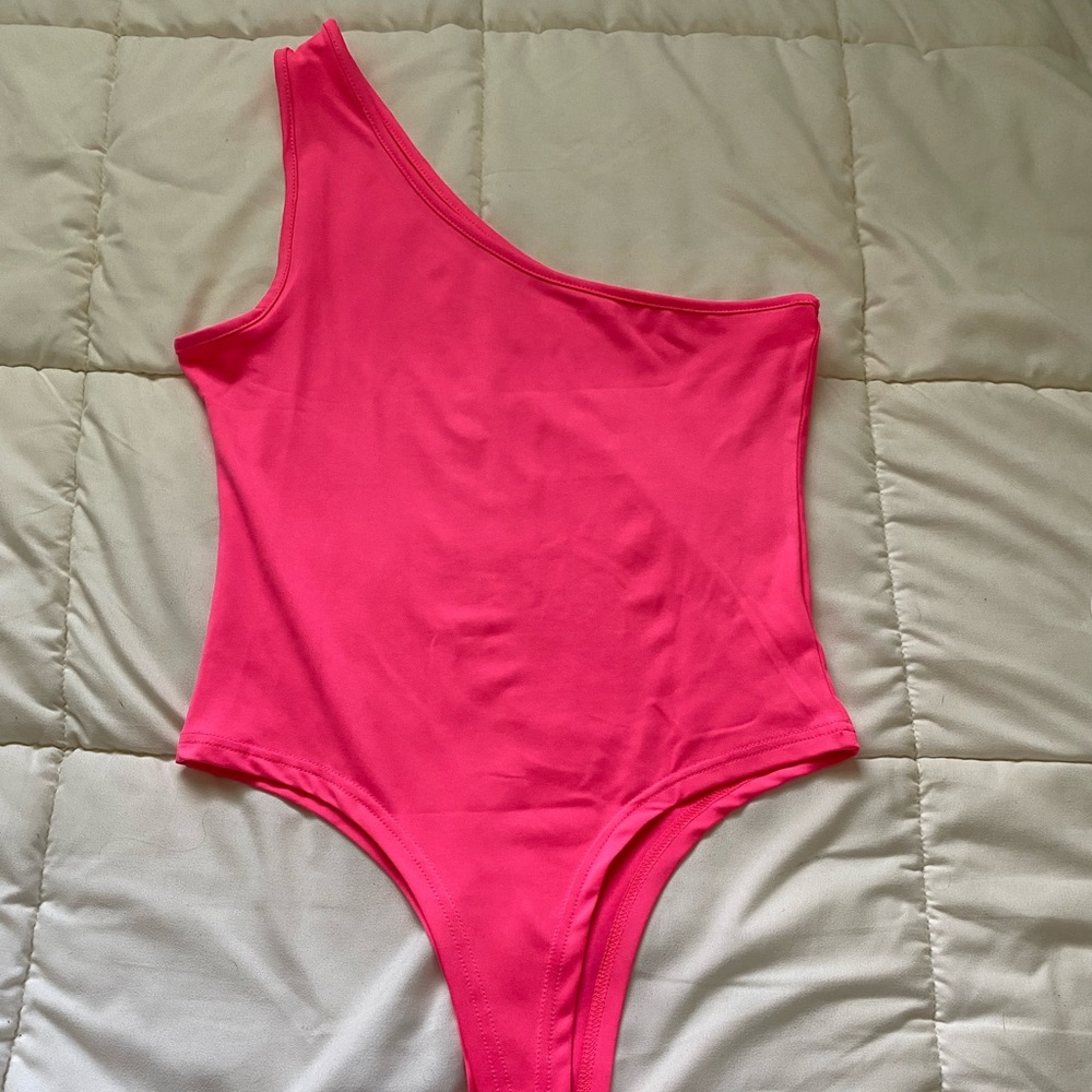 Hot pink body suit